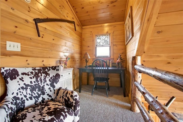 office with vaulted ceiling, carpet flooring, wooden ceiling, and wood walls