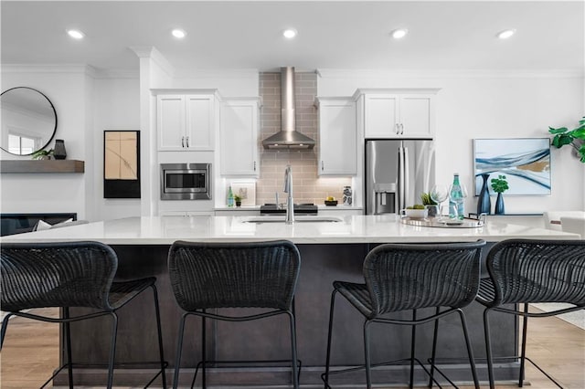 4933 Sudbrook Way Unit 230, Peachtree Corners, GA 30092 - kitchen with wall chimney exhaust hood, stainless steel appliances, crown molding, light countertops, and white cabinetry
