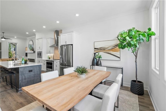4933 Sudbrook Way Unit 230, Peachtree Corners, GA 30092 - dining space featuring wood finished floors, recessed lighting, crown molding, a ceiling fan, and baseboards