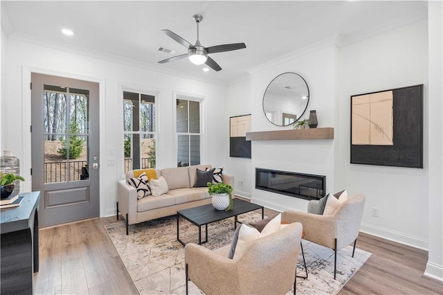 4933 Sudbrook Way Unit 230, Peachtree Corners, GA 30092 - living room featuring crown molding, light wood-type flooring, recessed lighting, ceiling fan, and baseboards