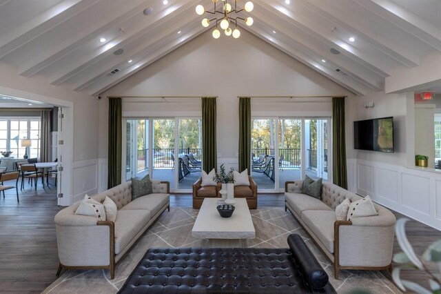 4933 Sudbrook Way Unit 230, Peachtree Corners, GA 30092 - living area featuring a decorative wall, wainscoting, recessed lighting, a chandelier, and high vaulted ceiling