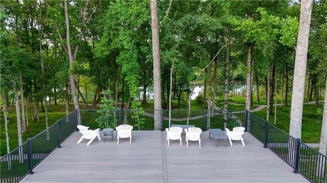 4933 Sudbrook Way Unit 230, Peachtree Corners, GA 30092 - wooden deck with view of wooded area