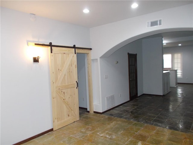 empty room with a barn door