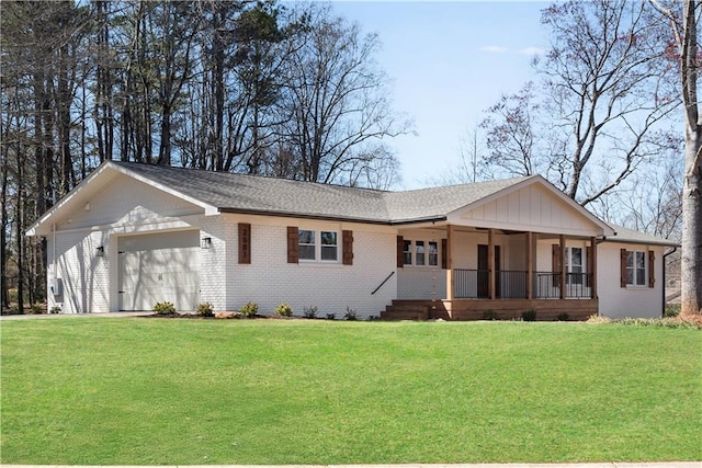 ranch-style house with brick siding, a porch, a front yard, and a garage