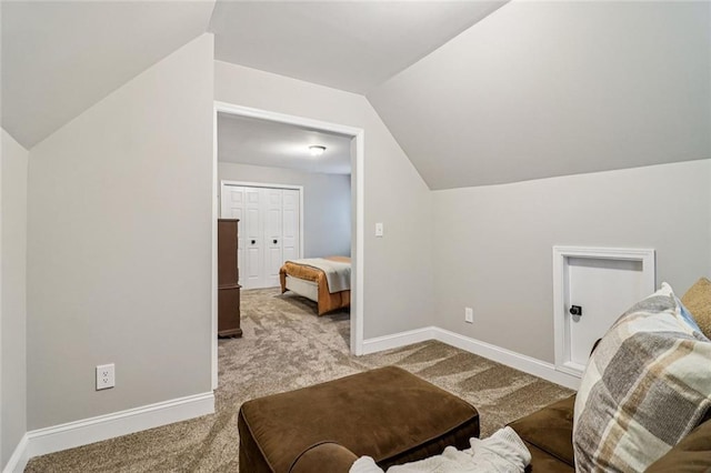 1006 Amberton Ln, Powder Springs, GA 30127 - sitting room with carpet flooring, lofted ceiling, and baseboards