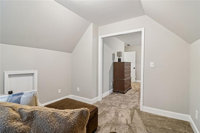 1006 Amberton Ln, Powder Springs, GA 30127 - bedroom featuring carpet floors, lofted ceiling, and baseboards
