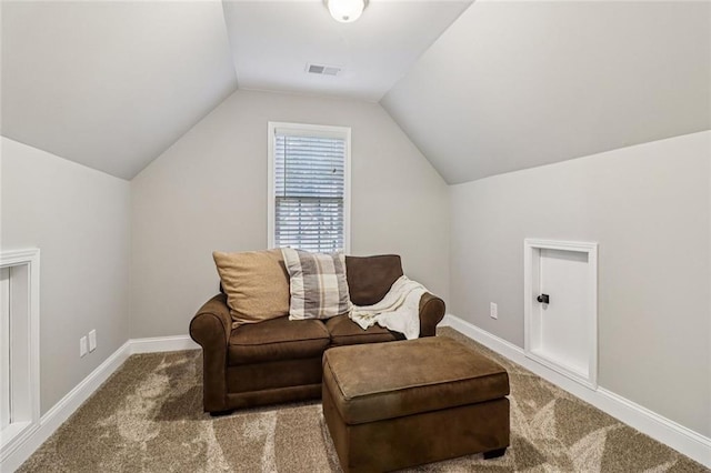 1006 Amberton Ln, Powder Springs, GA 30127 - living area with vaulted ceiling, carpet, and baseboards