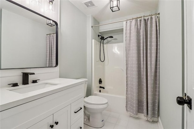 1006 Amberton Ln, Powder Springs, GA 30127 - full bath with toilet, vanity, shower / tub combo, and tile patterned flooring