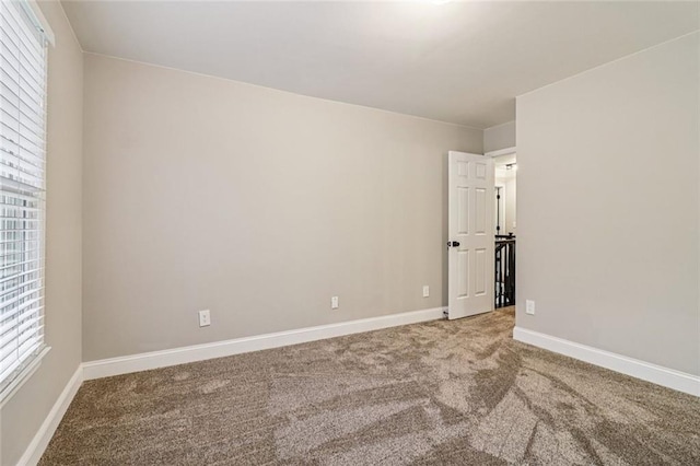1006 Amberton Ln, Powder Springs, GA 30127 - empty room featuring carpet and baseboards