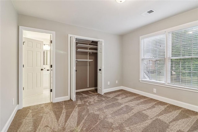 1006 Amberton Ln, Powder Springs, GA 30127 - unfurnished bedroom with carpet flooring and baseboards