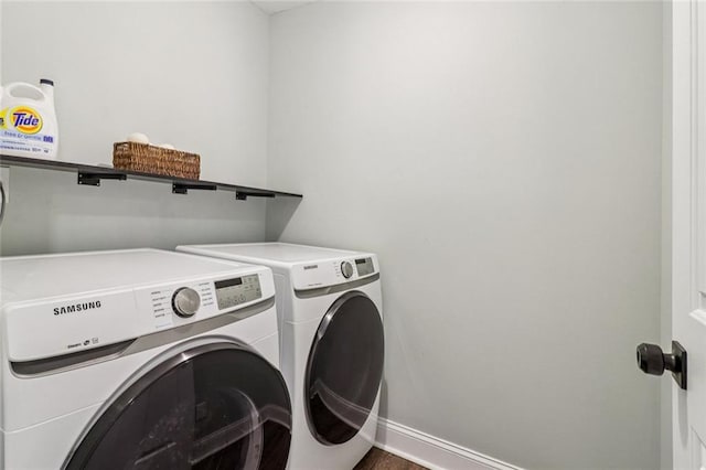 1006 Amberton Ln, Powder Springs, GA 30127 - washroom with independent washer and dryer and baseboards