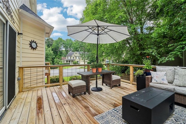 1006 Amberton Ln, Powder Springs, GA 30127 - wooden deck featuring an outdoor living space and view of wooded area