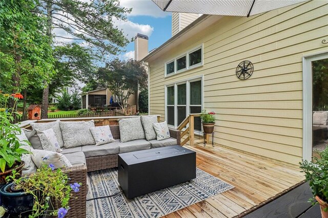 1006 Amberton Ln, Powder Springs, GA 30127 - wooden terrace featuring outdoor lounge area