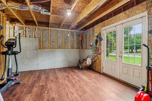 1006 Amberton Ln, Powder Springs, GA 30127 - below grade area featuring french doors and wood finished floors