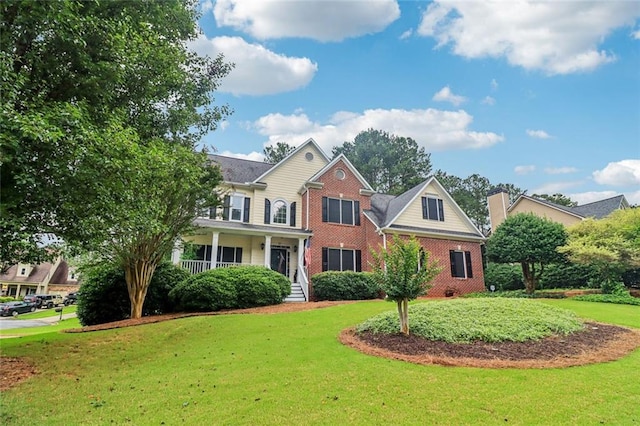 1006 Amberton Ln, Powder Springs, GA 30127 - view of front of house featuring a front yard and brick siding