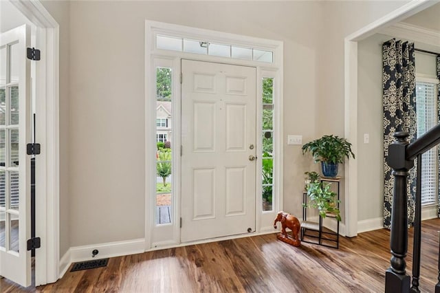 1006 Amberton Ln, Powder Springs, GA 30127 - foyer with baseboards and wood finished floors