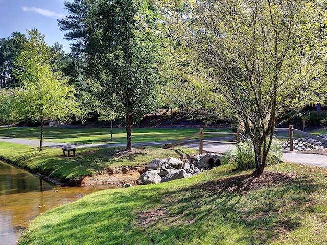 1006 Amberton Ln, Powder Springs, GA 30127 - surrounding community featuring a lawn