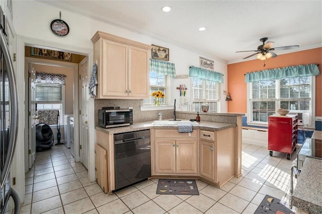kitchen featuring ornamental molding, light brown cabinetry, black dishwasher, and light tile patterned floors