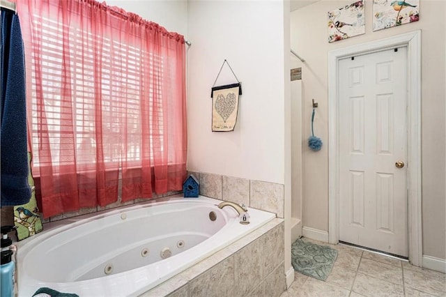bathroom featuring tile patterned flooring and plus walk in shower