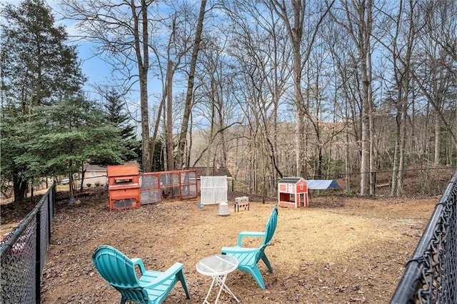 view of yard with an outdoor structure