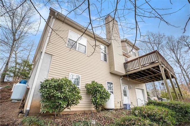 rear view of house with a balcony