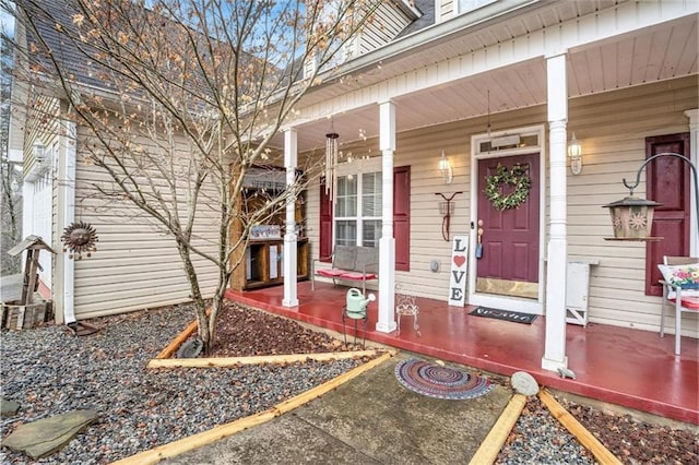 doorway to property with a porch