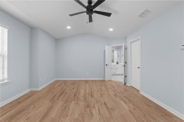 interior space with visible vents, a healthy amount of sunlight, light wood-type flooring, and baseboards