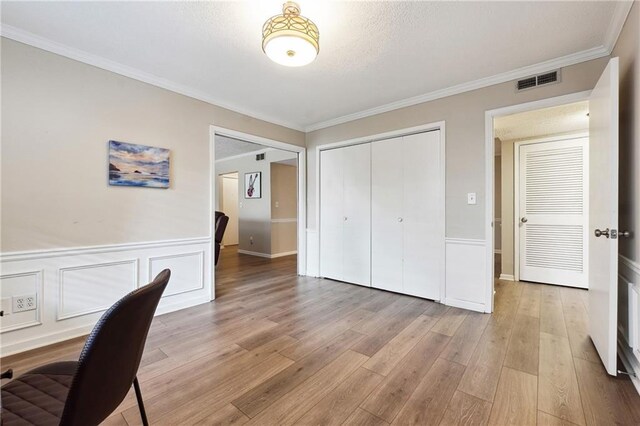 6851 Roswell Rd Unit E1, Atlanta, GA 30328 - office featuring wainscoting, visible vents, ornamental molding, and light wood finished floors