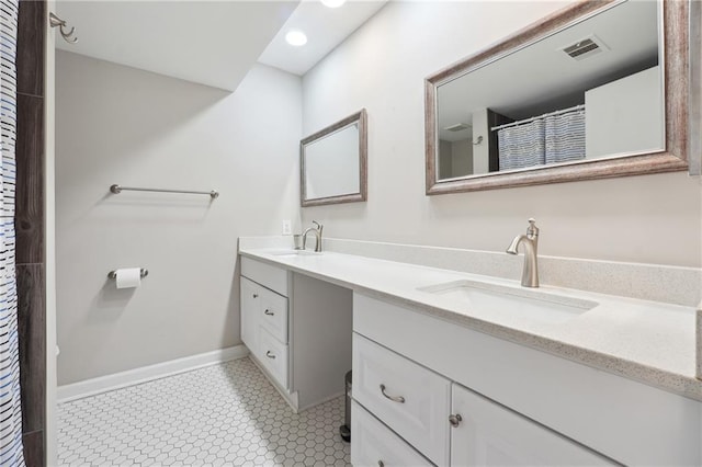 6851 Roswell Rd Unit E1, Atlanta, GA 30328 - bathroom with a sink, recessed lighting, double vanity, and visible vents