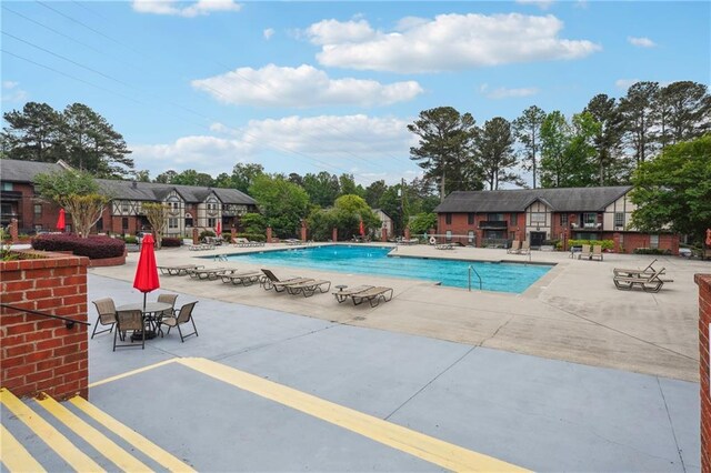 6851 Roswell Rd Unit E1, Atlanta, GA 30328 - community pool with a patio