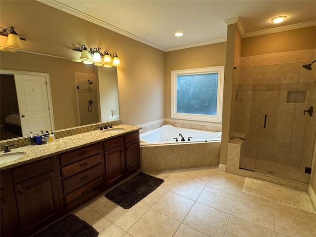 bathroom with ornamental molding, vanity, and shower with separate bathtub