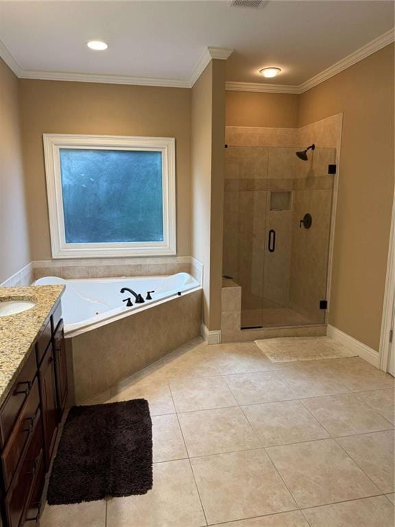 bathroom with vanity, tile patterned flooring, crown molding, and shower with separate bathtub