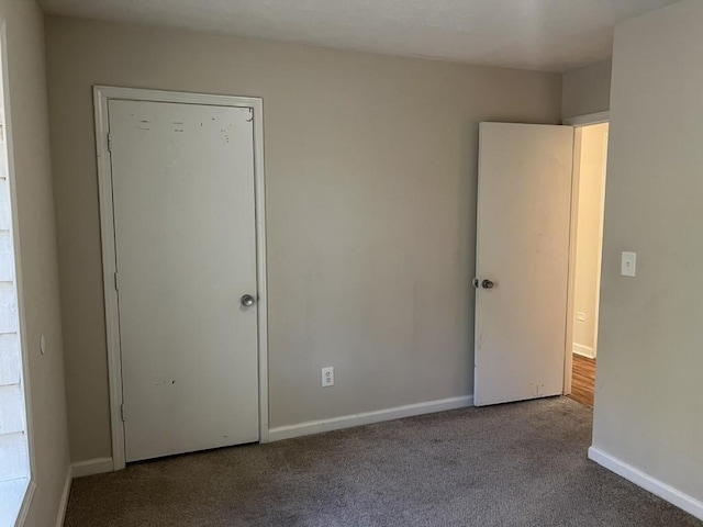 unfurnished bedroom featuring carpet floors