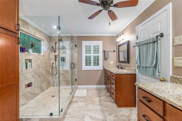 324 Kibbee Rd, Mcdonough, GA 30252 - full bath with vanity, a stall shower, a ceiling fan, crown molding, and baseboards