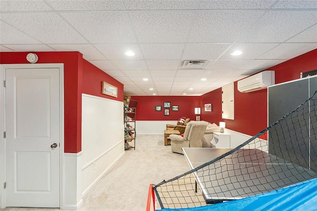 324 Kibbee Rd, Mcdonough, GA 30252 - home theater featuring an AC wall unit, a paneled ceiling, carpet flooring, and recessed lighting