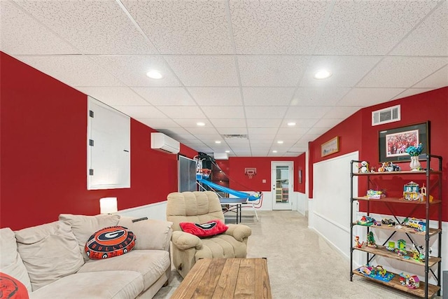 324 Kibbee Rd, Mcdonough, GA 30252 - carpeted living area featuring a drop ceiling, recessed lighting, and an AC wall unit