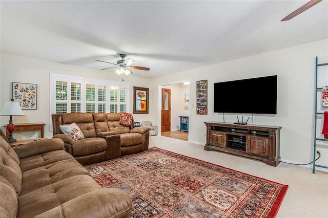 324 Kibbee Rd, Mcdonough, GA 30252 - carpeted living room featuring a ceiling fan and baseboards