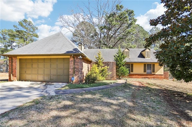 view of front facade featuring brick siding, driveway, and an attached garage