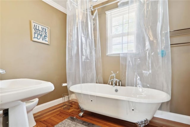 97 Griffin St NW, Atlanta, GA 30314 - full bathroom featuring a soaking tub, wood finished floors, and ornamental molding
