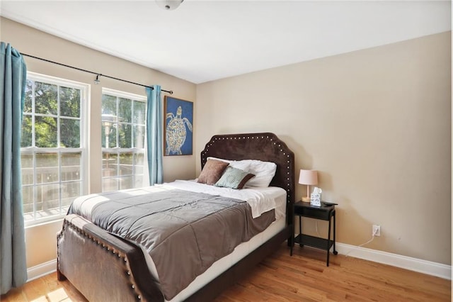 97 Griffin St NW, Atlanta, GA 30314 - bedroom featuring baseboards and wood finished floors