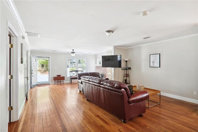 97 Griffin St NW, Atlanta, GA 30314 - living area featuring light wood-style flooring, a ceiling fan, and ornamental molding