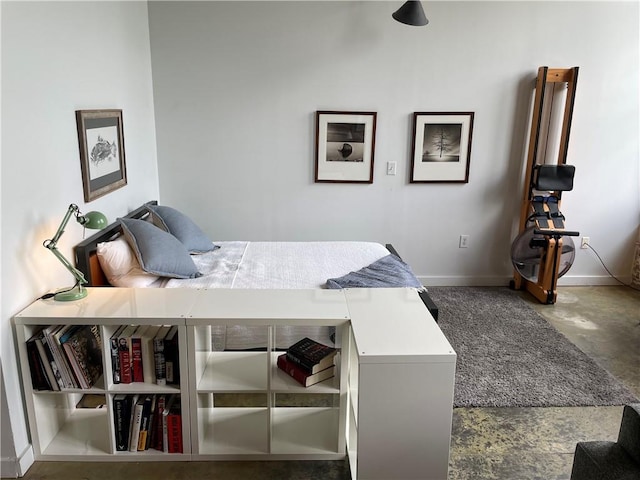 bedroom featuring baseboards
