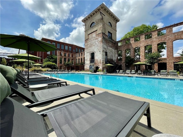 pool with a patio area