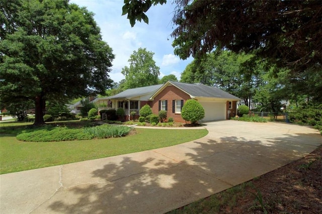 single story home with a front lawn and a garage