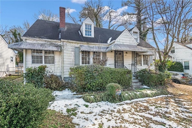 view of new england style home