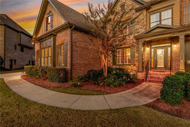 view of property exterior at dusk