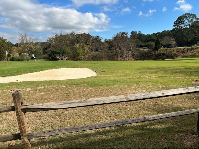 surrounding community with a lawn