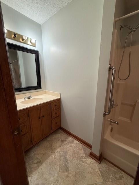 100 Walter Leon Dr, Chatsworth, GA 30705 - bathroom featuring a textured ceiling, vanity, and shower / bathtub combination