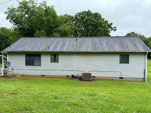 100 Walter Leon Dr, Chatsworth, GA 30705 - back of property with crawl space, a lawn, and roof with shingles