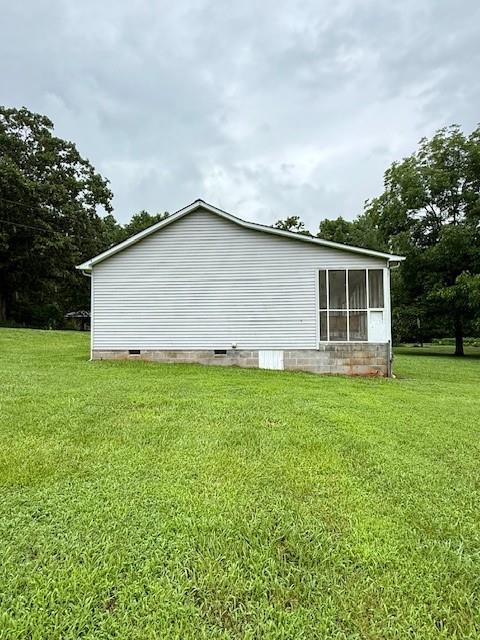 100 Walter Leon Dr, Chatsworth, GA 30705 - view of home's exterior with crawl space and a lawn